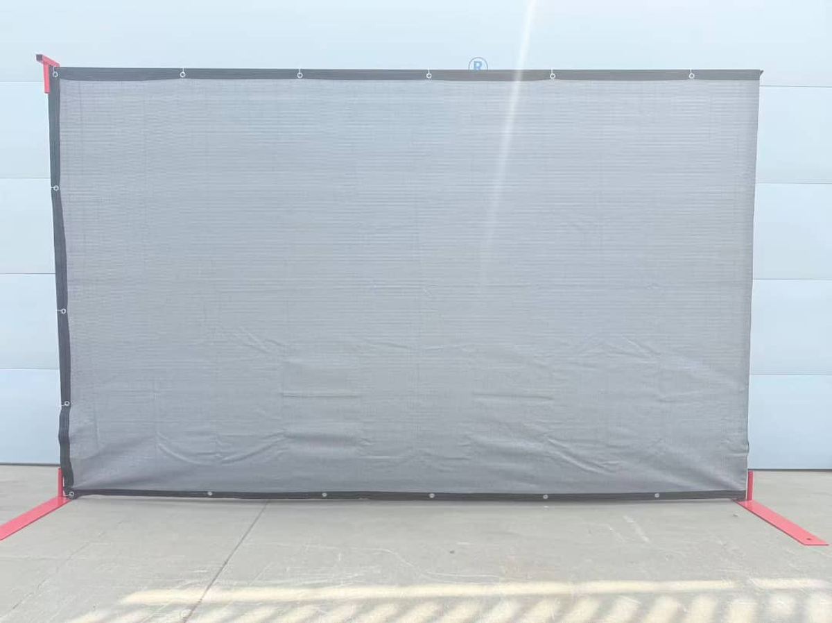 Privacy windscreen mesh installed on a temporary fence panel